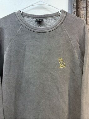 OVO Men's Dark Gray Crewneck Sweatshirt with Gold Owl Emblem